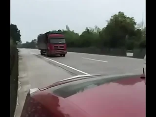 Chinese man and his girlfriend having sex in the car beside the highway